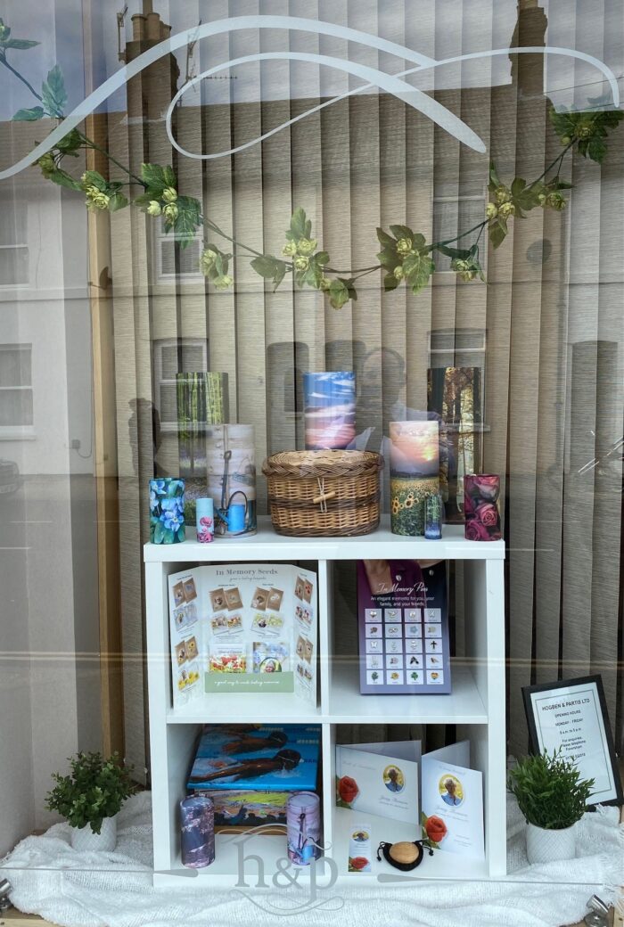 Hop Festival window with different items you can buy to remember your loved one